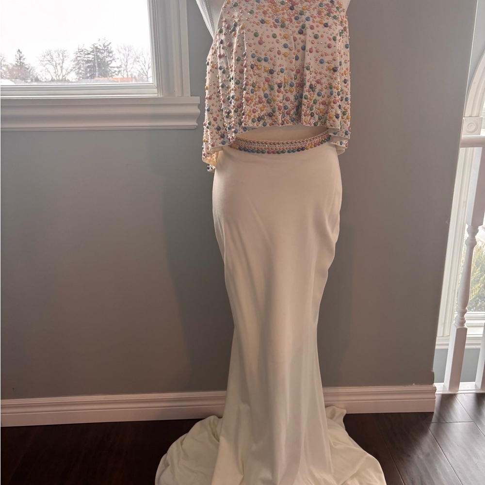 Two piece Tony Bowls set NWT Size 10 NWT